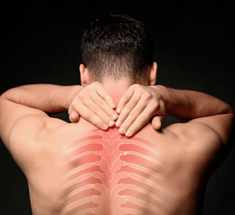 A man is worried about osteochondrosis of the thoracic spine